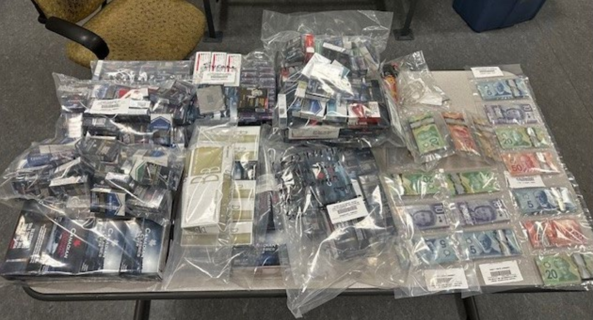 Cigarettes, and cash were among the items seized by Calgary police in an investigation into the trafficking of contraband cigarettes.