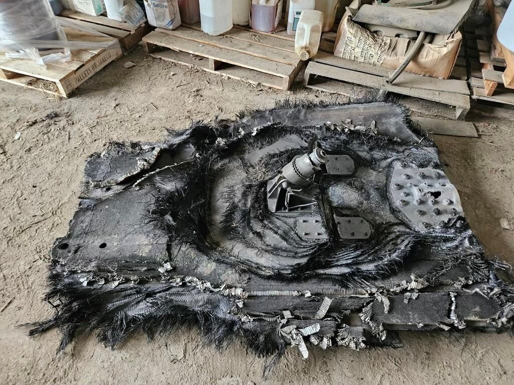 Barry Sawchuk found a giant piece of suspected space debris, as shown in this handout image provided by Sawchuk, in the field of his farm located near Ituna, Sask., on Feb. 28, 2024.