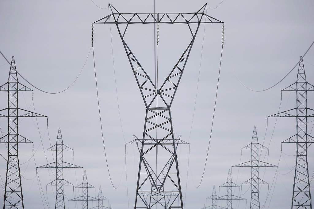 Manitoba Hydro power lines are photographed just outside Winnipeg, Monday, May 1, 2018. A union that represents approximately 120 workers who provide meter readings, inspections and location services for Manitoba Hydro customers says the members have voted to strike in support of their demands for a new contract. THE CANADIAN PRESS/John Woods.