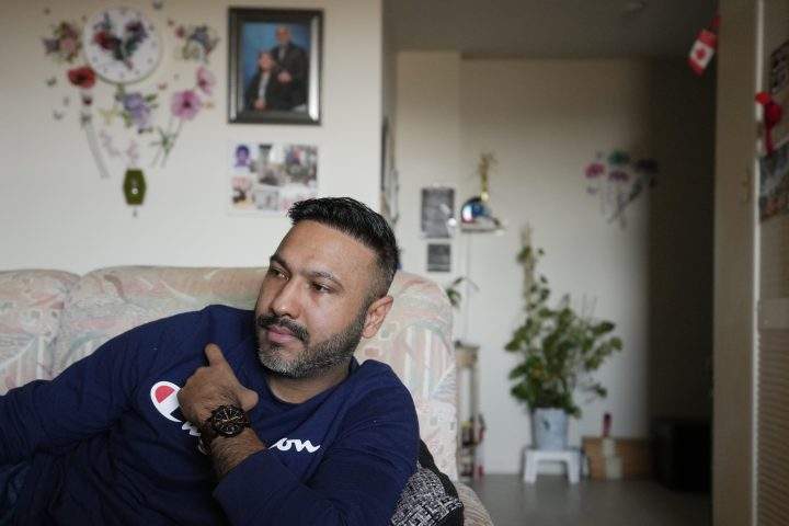 Thorncliffe Park resident Alim Datoo is pictured in his home on Monday, April 22, 2024.