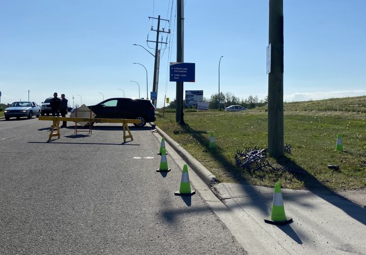 A spike belt is seen at 56th Avenue in Leduc, Alta., on June 20, 2024 as police investigate an undisclosed incident.