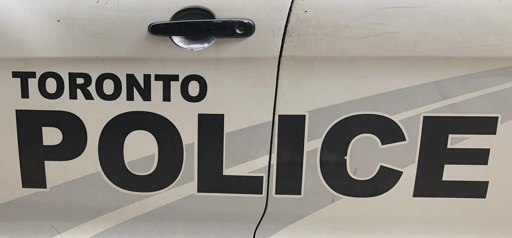 Toronto Police lettering is shown on the side of a police vehicle in Toronto on August 2, 2023. THE CANADIAN PRESS/Richard Buchan.