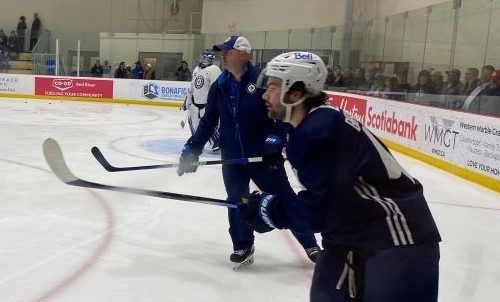 Winnipeg Jets prospect Colby Barlow skates in drills at the team's 2024 development camp.