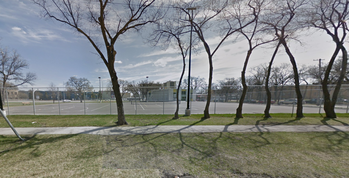 Before photo of the basketball court on River Ave, in Winnipeg.