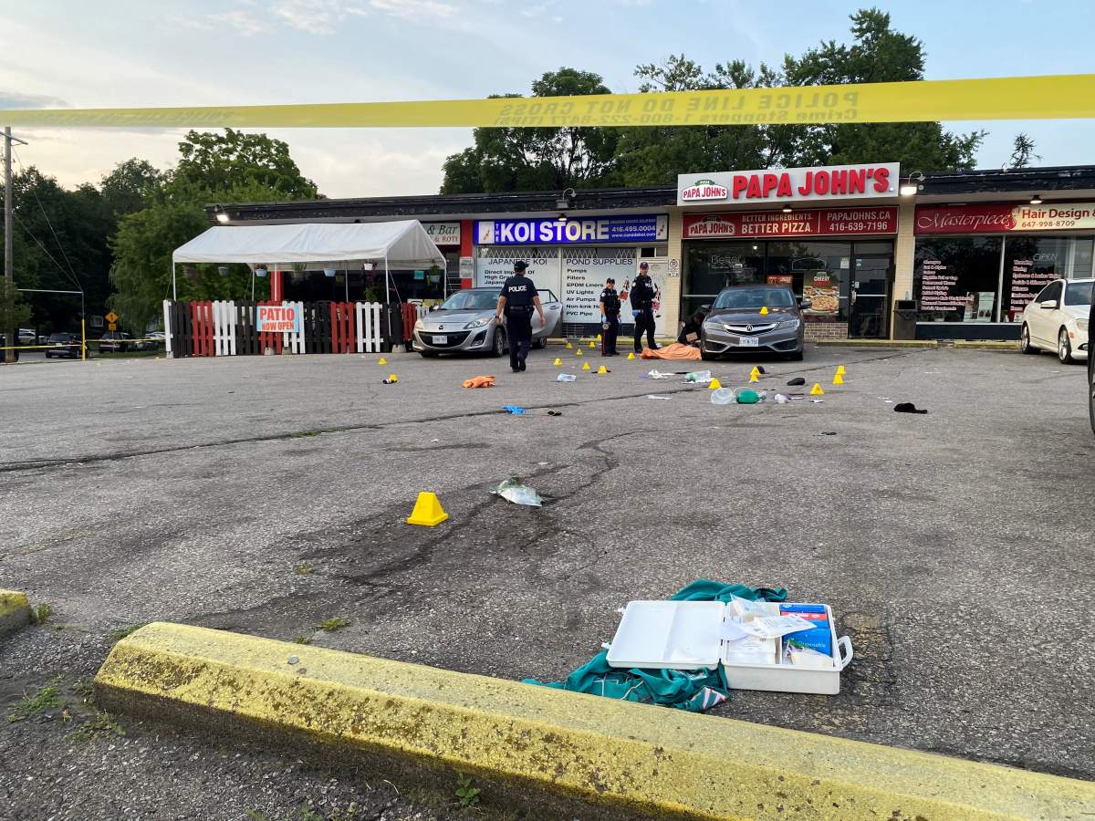 Police investigate a quadruple shooting in Toronto on July 24, 2024.