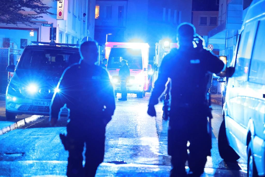Police and ambulances near the scene where people were killed and injured in an attack at a festival in Solingen, western Germany, the German dpa news agency reported, Friday, Aug. 23, 2024. (Gianni Gattus/dpa via AP).