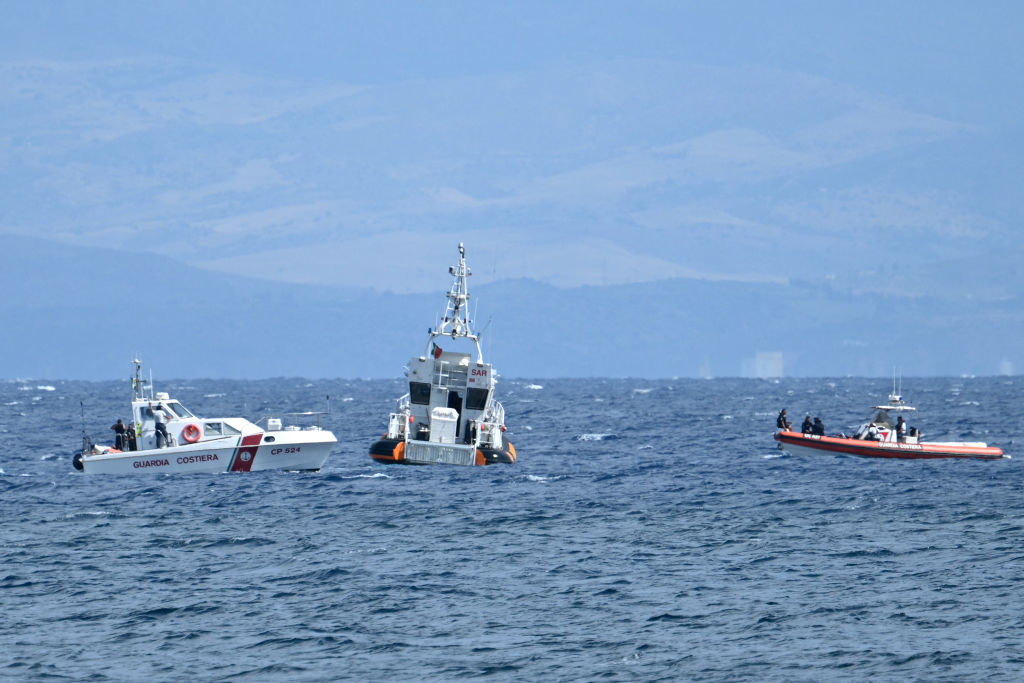 Rescue boats operate off Porticello, on August 20, 2024 near Palermo a day after the British-flagged luxury yacht Bayesian sank.