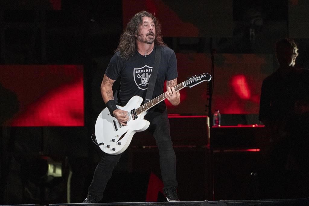 FILE - Dave Grohl of the Foo Fighters performs at Festival d'été de Québec, July 8, 2023, at Plains of Abraham in Quebec City. 