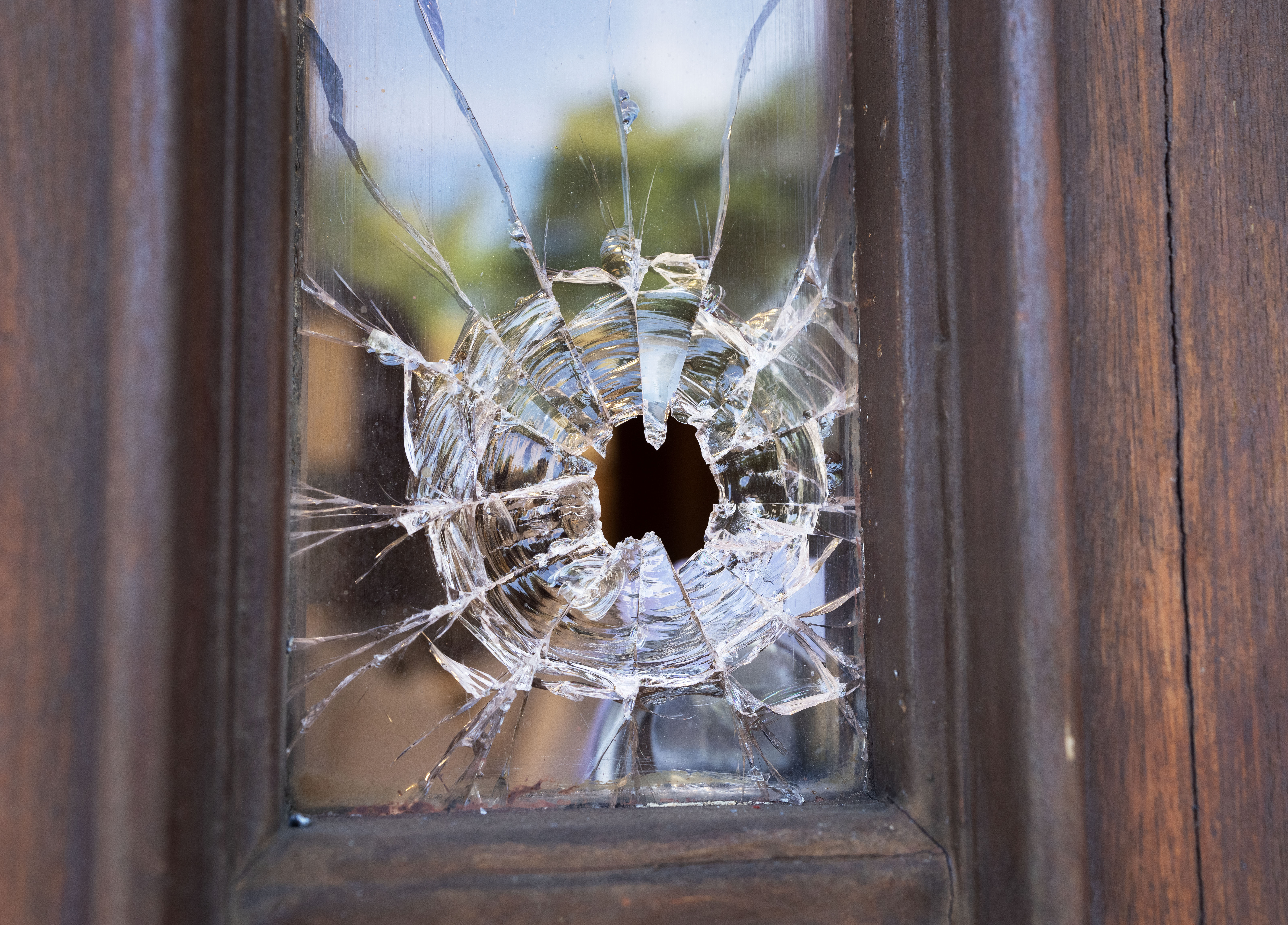 Bullet hole in door of Bell Yeshiva Katana school in Montreal, May 30, 2024. THE CANADIAN PRESS/Ryan Remiorz.