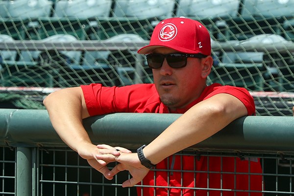 Logan Watkins in the dugout with the Winnipeg Goldeyes.