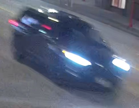 A still photo from the video of a dark SUV travelling in the area of Main Street and Union Street on June 5.