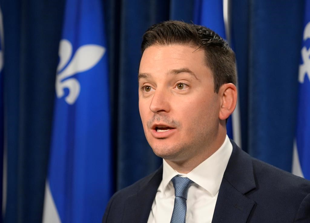 Quebec government house leader and Justice Minister Simon Jolin-Barrette announces a survey on whether to change time in the fall and the spring at the legislature in Quebec City, Tuesday, Oct. 22, 2024.