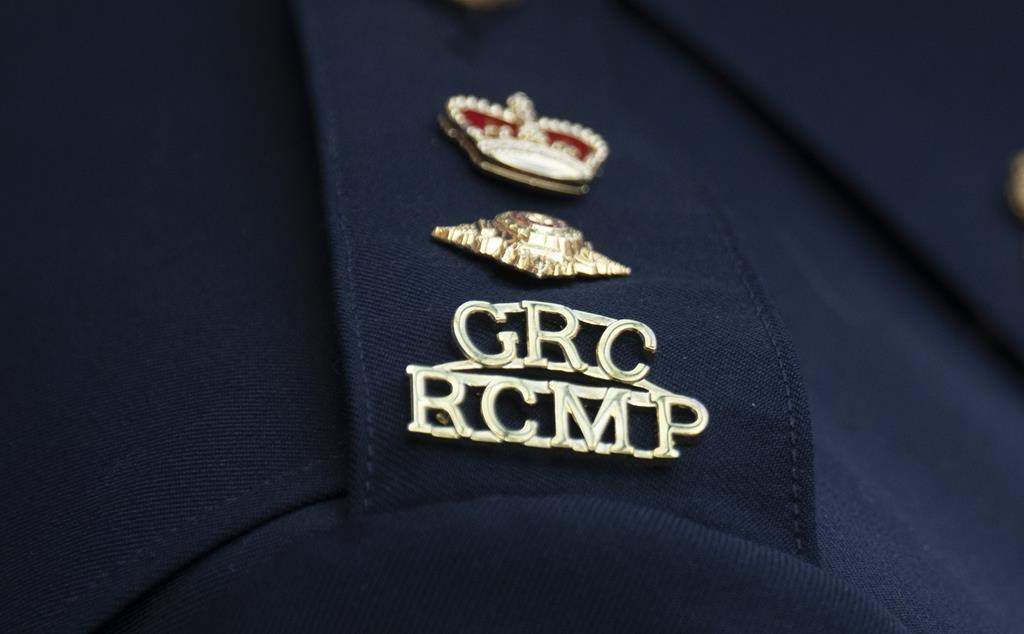 The RCMP logo is seen on the shoulder of a superintendent during a news conference in St. John's, N.L., on June 24, 2023.