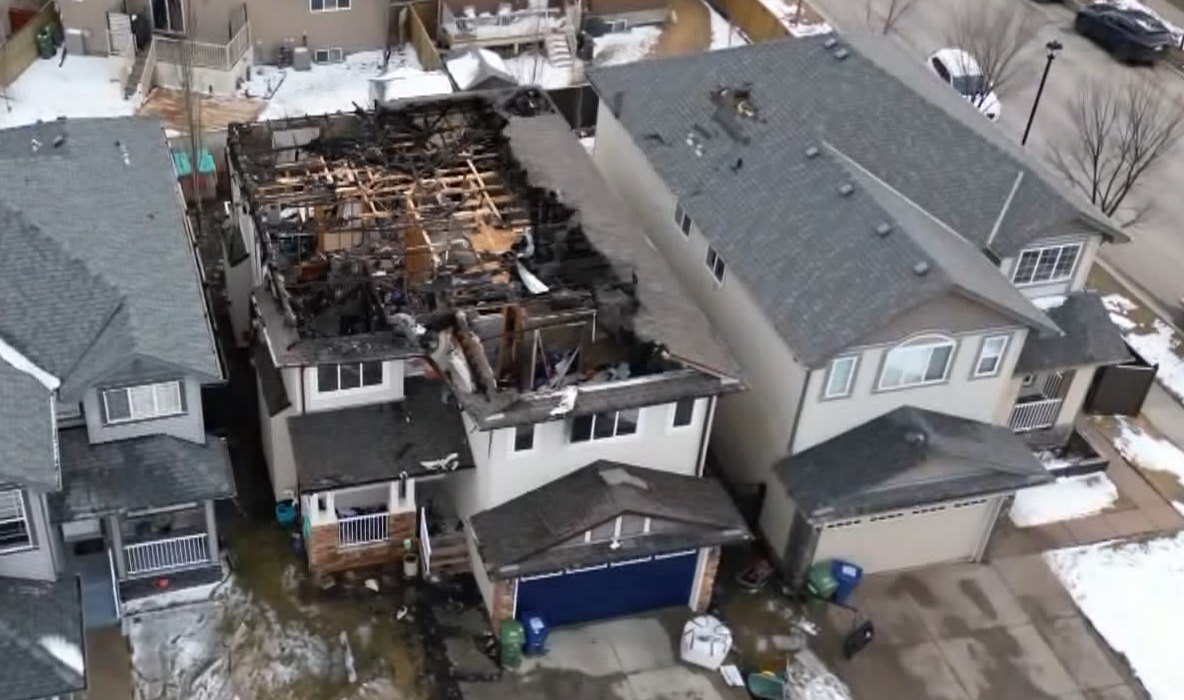 The roof and the top floor of this Airdrie home were destroyed after a fire in the home on Tuesday afternoon.