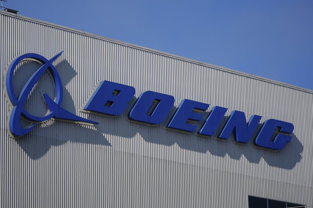 FILE - The Boeing logo is displayed at the company's factory, Sept. 24, 2024, in Renton, Wash. (AP Photo/Lindsey Wasson, File).