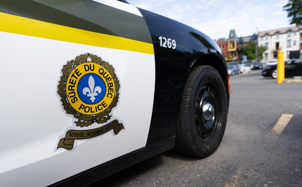 A Quebec provincial police car is seen at their headquarters in Montreal, Tuesday, Sept. 10, 2024. A traffic control worker has been killed after being hit by a heavy truck in Drummondville, about 100 kilometres northeast of Montreal. 