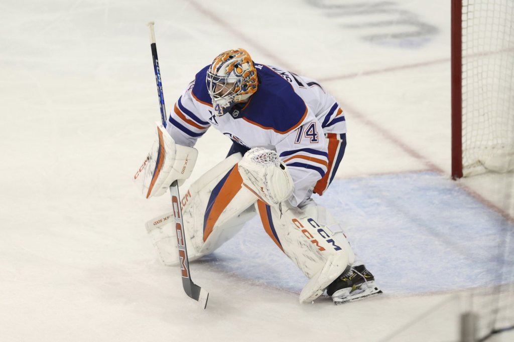Edmonton Oilers' Stuart Skinner defends the goal during the third period of an NHL hockey game against the New York Rangers Sunday, March 16, 2025, in New York.