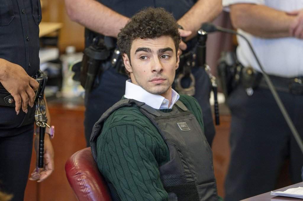 FILE - Luigi Mangione , accused of fatally shooting the UnitedHealthcare CEO Brian Thompson in New York City and leading authorities on a five-day search is scheduled, appears in court for a hearing, Friday, Feb. 21, 2025, in New York.