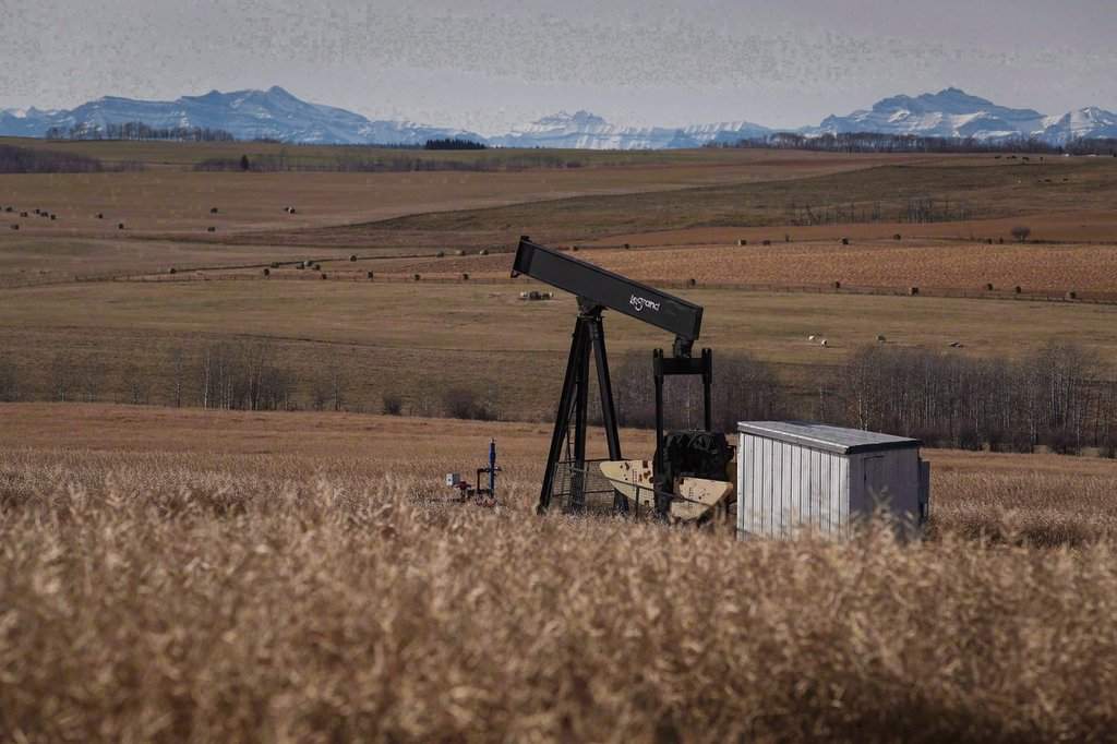 A decommissioned pumpjack is shown at a well head on an oil and gas installation near Cremona, Alta., Saturday, Oct. 29, 2016.
