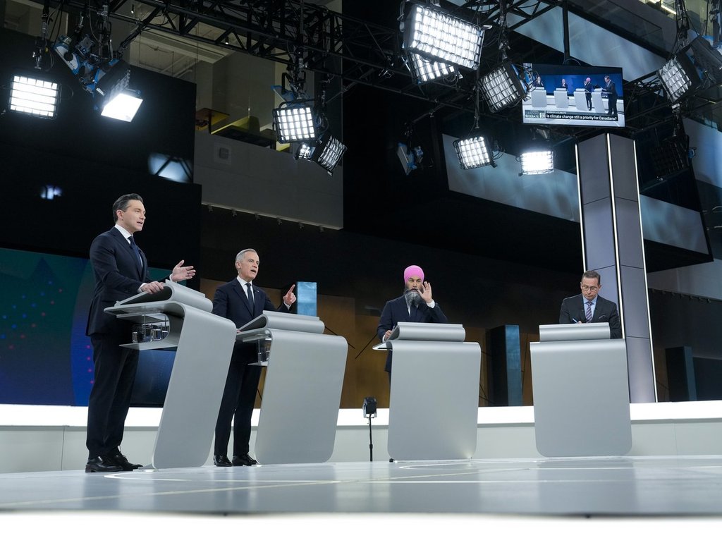Conservative Leader Pierre Poilievre, left to right, Liberal Leader Mark Carney, New Democratic Party Leader Jagmeet Singh and Bloc Québécois Leader Yves-Francois Blanchet at English-language leaders’ debate in Montreal, April 17, 2025.