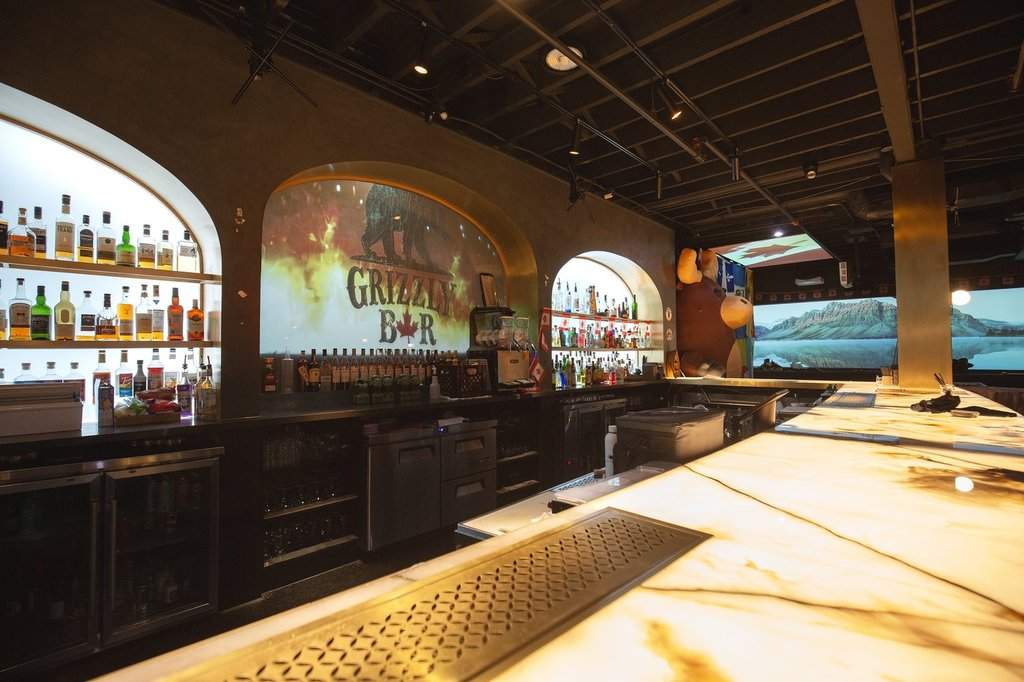 The main bar is shown at Grizzly Bar, a new Canadiana-themed bar in Toronto, Saturday, April 5, 2025.