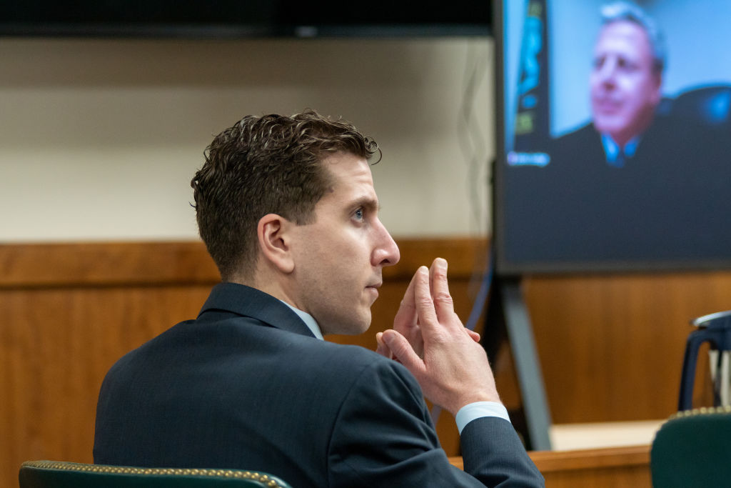 Bryan Kohberger listens to arguments during a hearing to overturn his grand jury indictment on October 26, 2023 in Moscow, Idaho. Kohberger, a former criminology PhD student, was indicted earlier this year in the November 2022 killings of Madison Mogen, 21; Kaylee Goncalves, 21; Xana Kernodle, 20; and Ethan Chapin, 20, in an off-campus apartment near the University of Idaho.