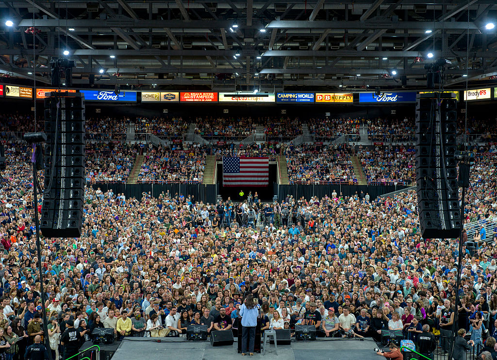U.S. Rep. Alexandria Ocasio-Cortez (D-NY) speaks to a full auditorium as part of the “Fighting Oligarchy” tour on April 14, 2025 in Nampa, Idaho. According to event organizers, 12,500 people attended the rally.