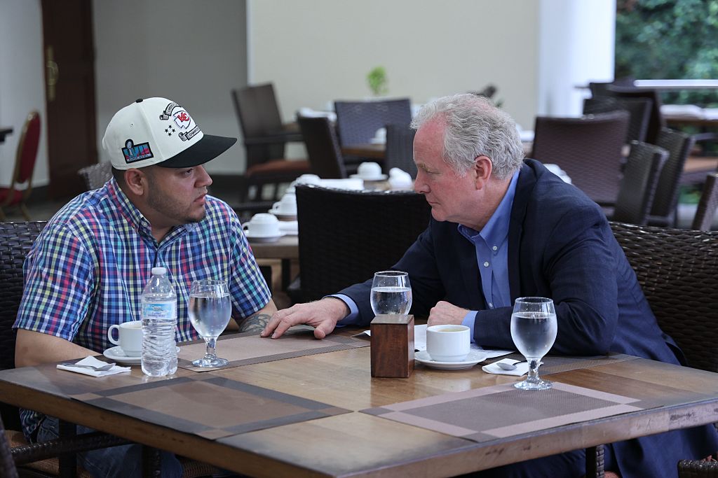 In this handout provided by Sen. Van Hollen's Office, U.S. Sen. Chris Van Hollen (D-MD) meets with Kilmar Armando Abrego Garcia (L) at an undisclosed location on April 17, 2025 in San Salvador, El Salvador. Abrego Garcia, a Maryland resident, was illegally deported by the Trump administration and has been held in prison in El Salvador since March 15.