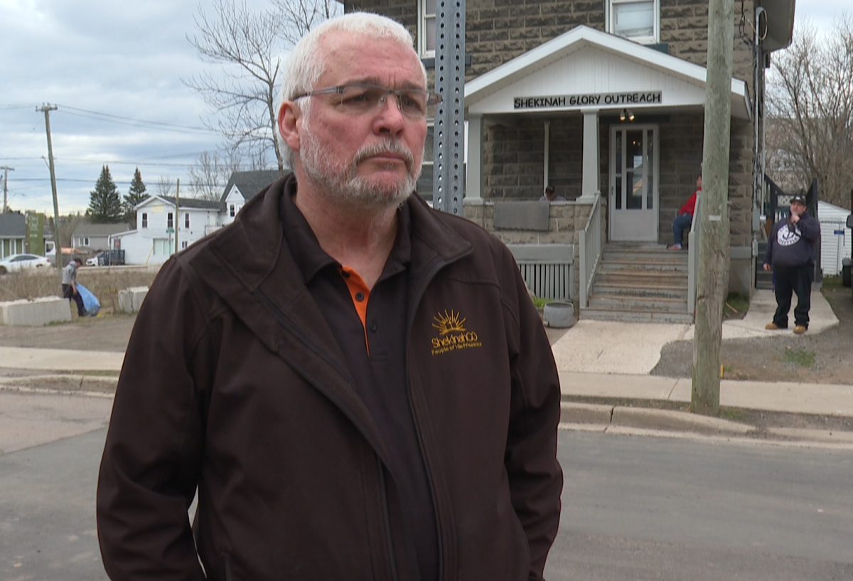 Founding Director Cal Maskery stands in front one of the buildings for the ShekinahGO treatment centre.