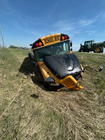 Treherne RCMP are investigating a crash between a school bus and a tractor.