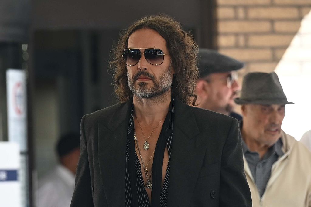 Actor-comedian Russell Brand arrives at Southwark Crown Court for a hearing on charges of rape, indecent assault, and two counts of sexual assault involving four women in London, United Kingdom on May 30, 2025. The alleged offenses occurred between 1999 and 2005 in Bournemouth and Westminster.
