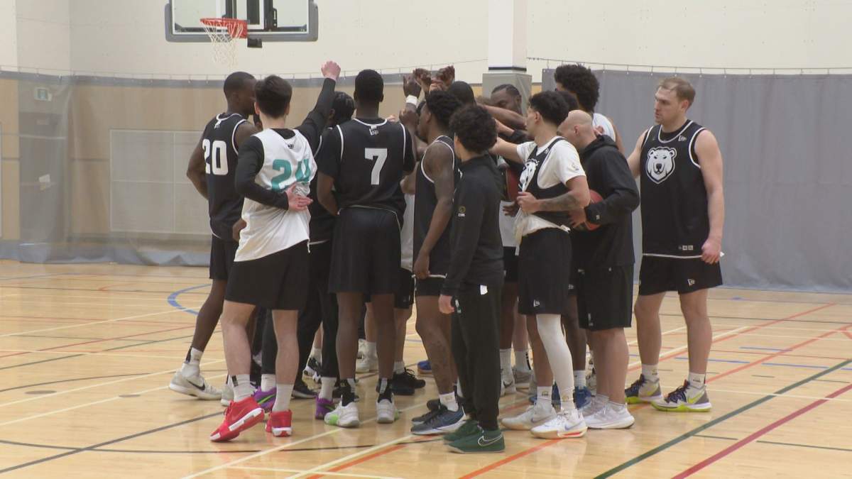 The Sea Bears gather at centre court after their first day of training camp.