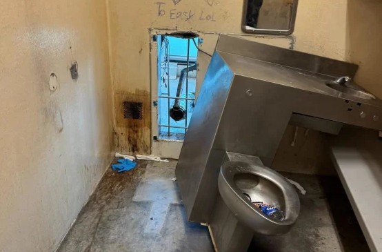 Prisoners at the Orleans Parish jail escaped through in the wall behind a toilet.