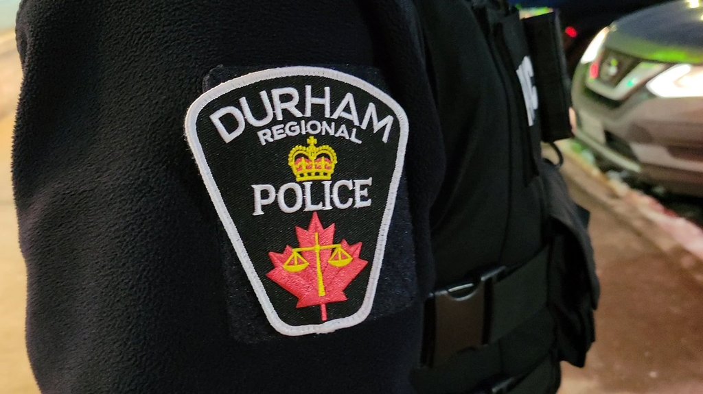 A Durham Regional Police officer's logo emblem is shown in Bowmanville, Ont. on Tuesday Feb. 28, 2023. 