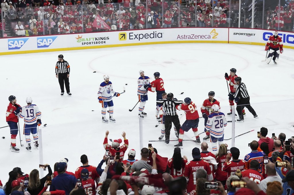 FILE - Toy rats litter the ice as the Edmonton Oilers and Florida Panthers scuffle at the end of the third period in Game 3 of the NHL hockey Stanley Cup Finals in Sunrise, Fla., Monday, June 9, 2025.