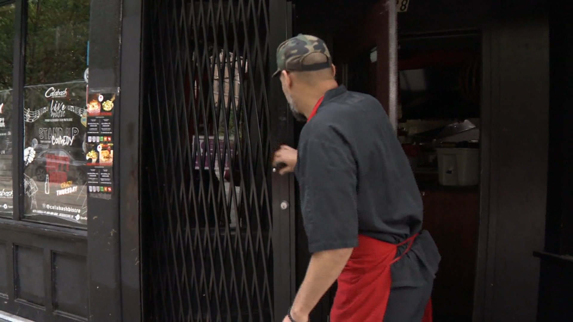 Cullin David navigates between his bistro and his commisary next door. 