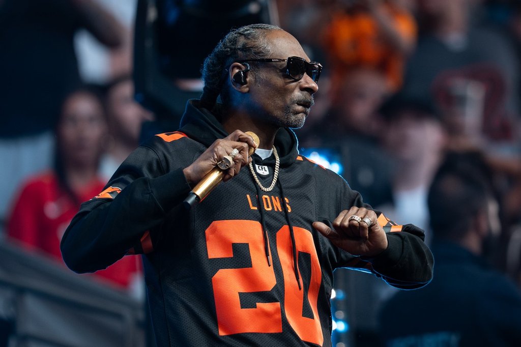 Snoop Dogg performs before the Edmonton Elks and the B.C. Lions play a CFL football game in Vancouver, on Saturday, June 7, 2025.
