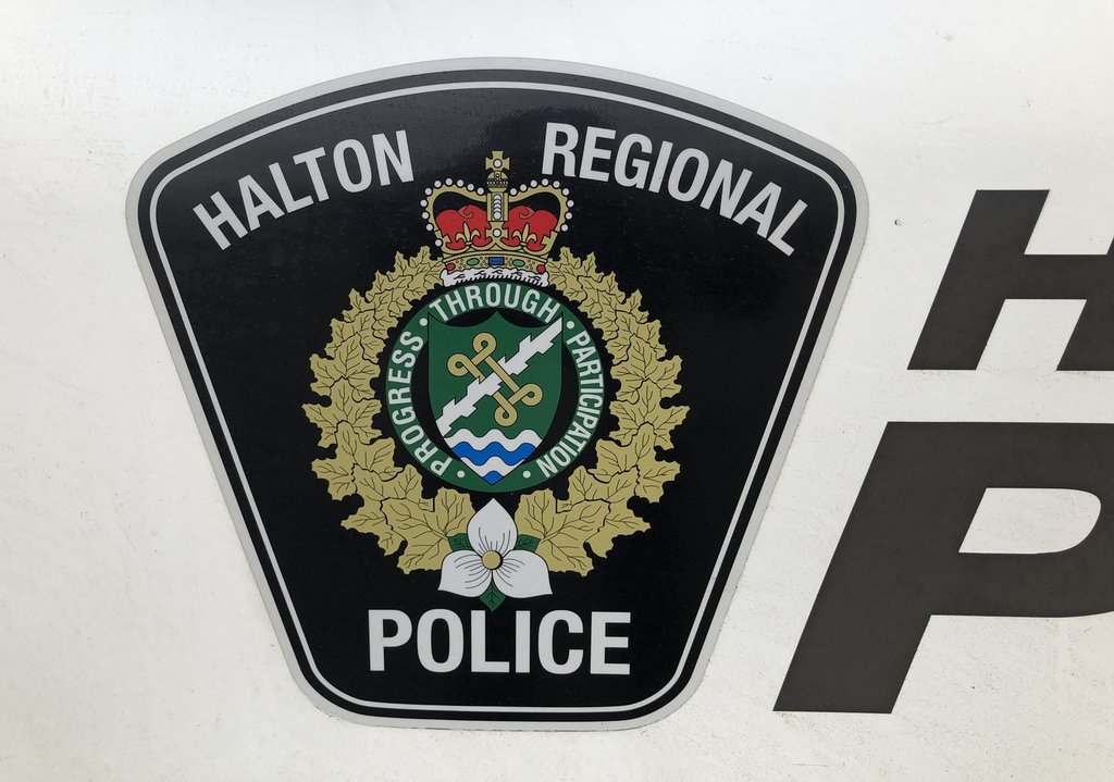 A Halton Regional Police logo is shown on a vehicle in Oakville, Ont., Wednesday, Jan.18, 2023. THE CANADIAN PRESS/Richard Buchan.