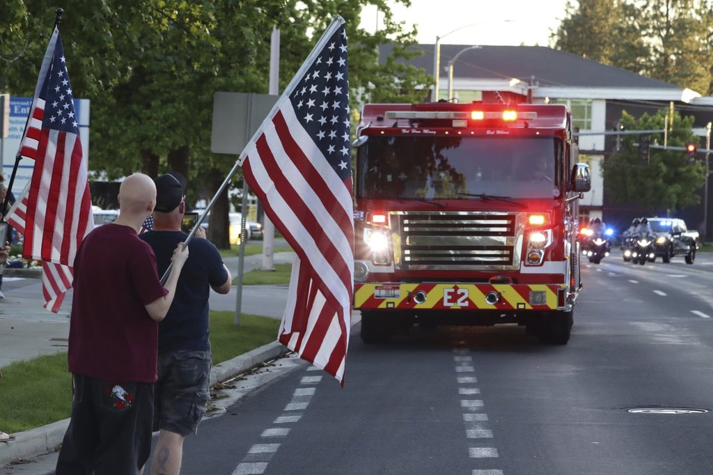 A procession from Kootenai Health headed to Spokane after a few firefighters were killed Sunday, June 29, 2025.
