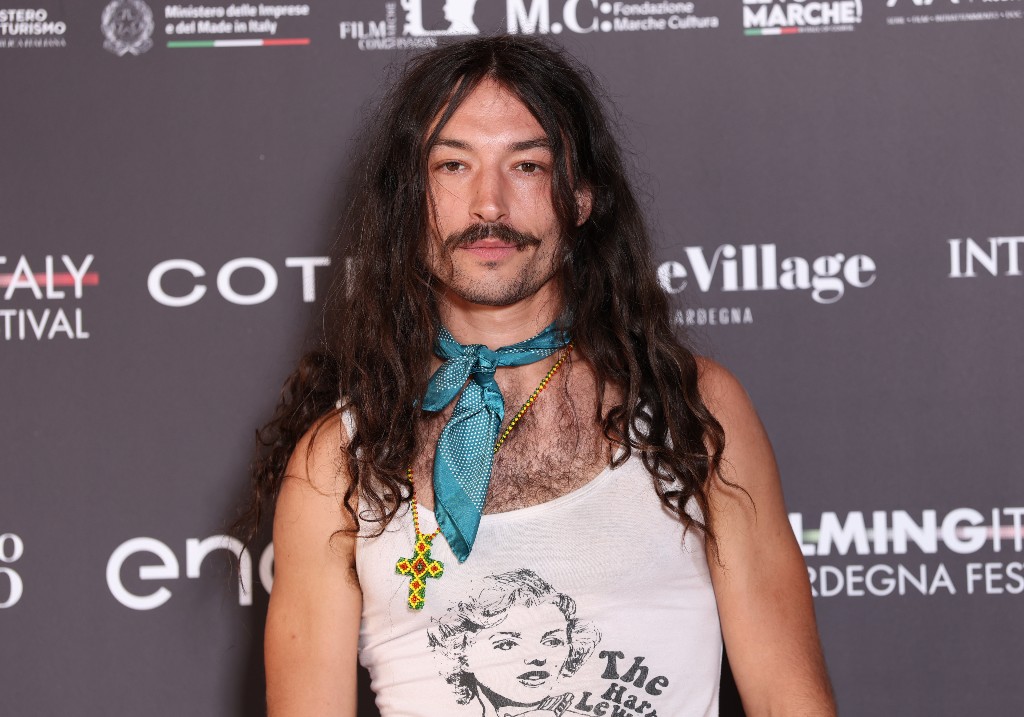 Ezra Miller attends Filming Italy 2025 - Press Conference on June 19, 2025 in Cagliari, Italy.