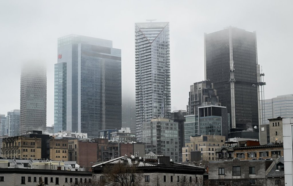 Fog hangs over the skyline of Montreal on Jan. 1, 2025.