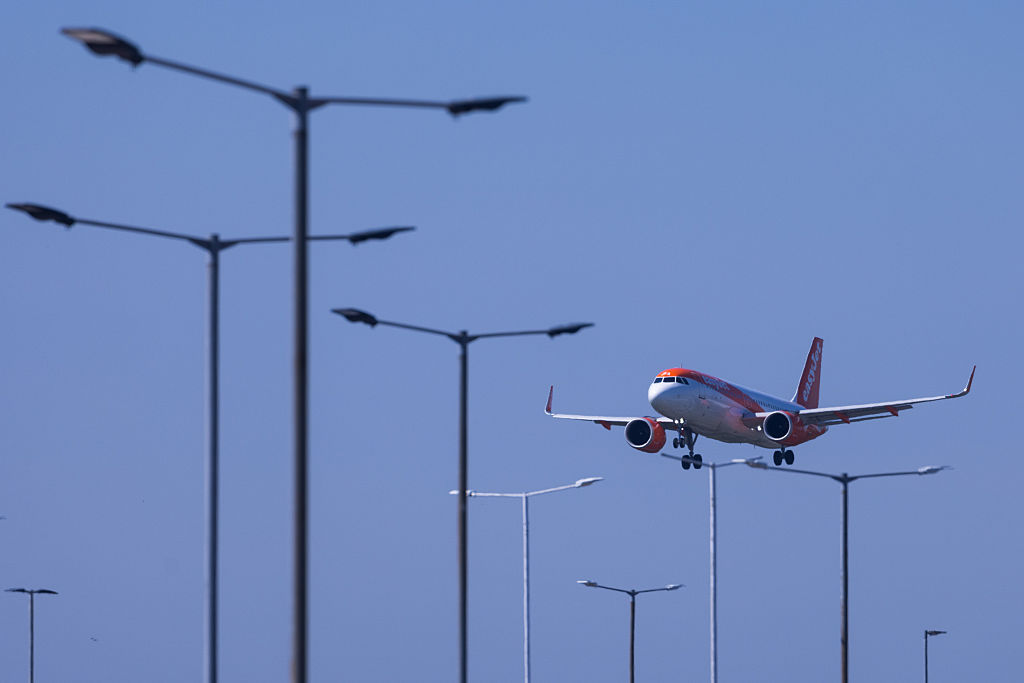 A passenger aircraft, operated by easyJet, makes its final approach to land at London Luton Airport in Luton, U.K., on Tuesday, May 13, 2025.