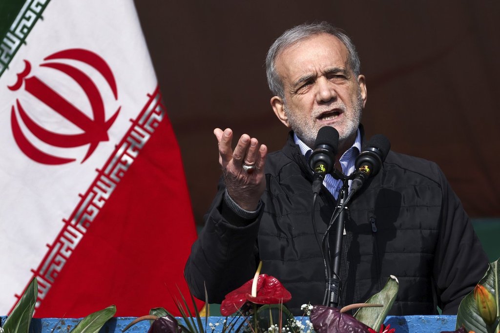 FILE - This photo released by the Iranian Presidency Office, President Masoud Pezeshkian speaks during a rally on Feb. 10, 2025, in Tehran, Iran. 