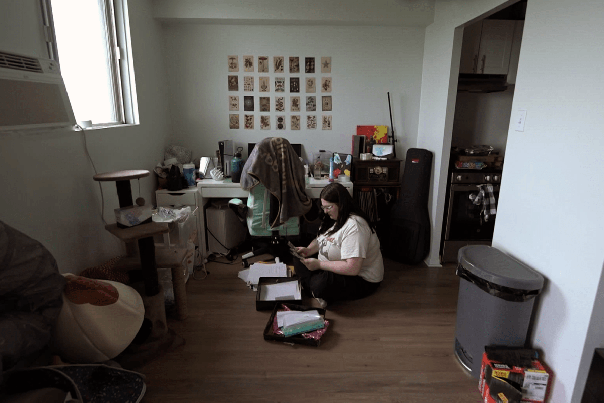 Isabelle Lebrun looks through documents