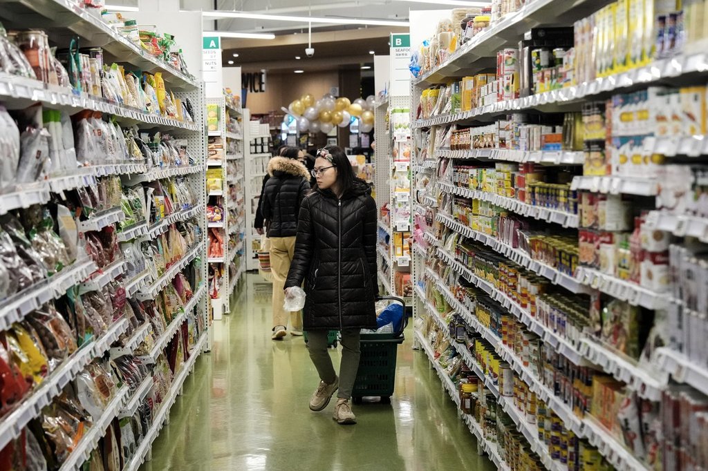 A customer shops at T&T Supermarket's location in Toronto's Fairview Mall, Friday, Nov. 28, 2024. THE CANADIAN PRESS/Chris Young.
