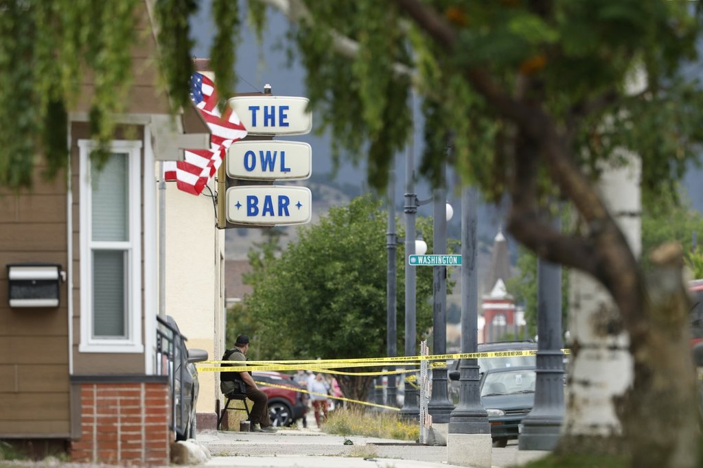 FILE - Police tape surrounds The Owl Bar in of Anaconda, Mont., on Friday, Aug. 1, 2025, following a fatal shooting. (Joseph Scheller/The Montana Standard via AP).