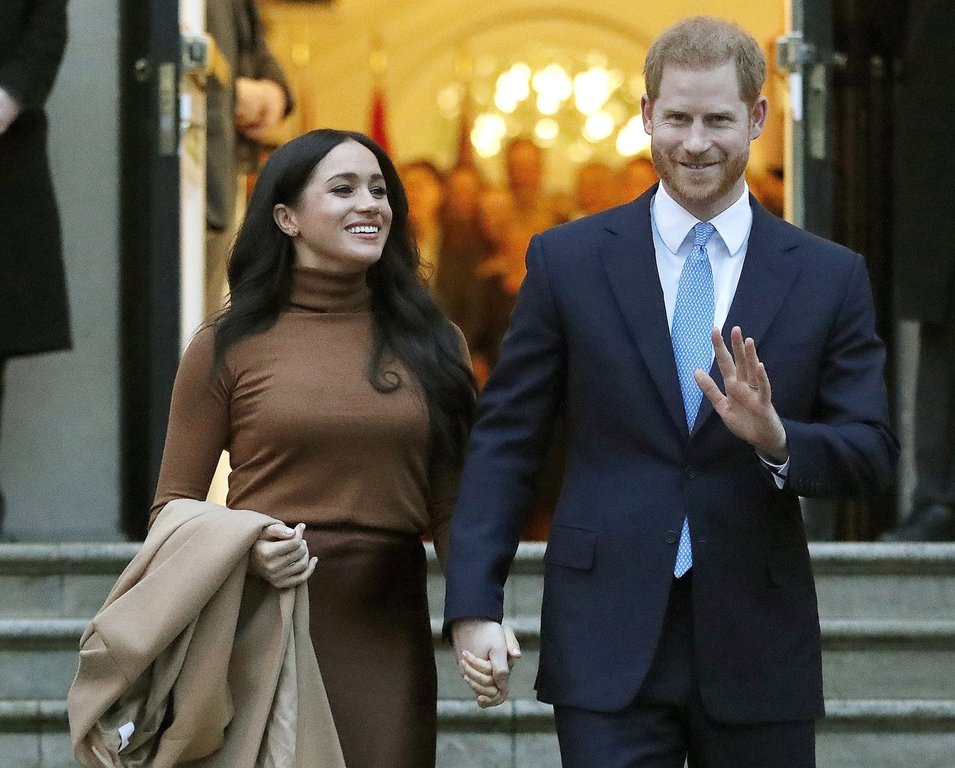 In this Jan. 7, 2020, file photo, Prince Harry and Meghan, Duchess of Sussex leave Canada House in London.