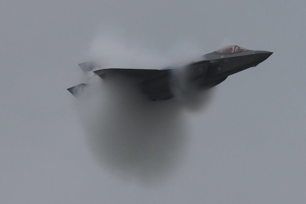 An F-35A fighter jet performs at a military base as part of celebrations marking the anniversary of the Royal Thai Air Force in Bangkok, Thailand, on Friday, March 7, 2025. (AP Photo/Sakchai Lalit).