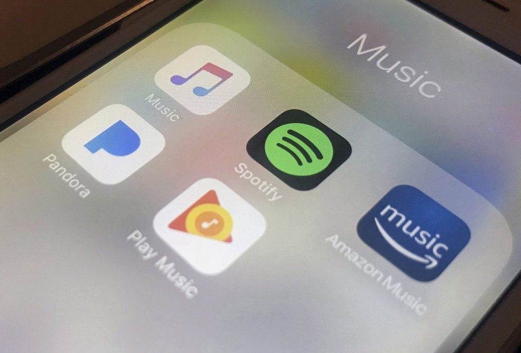 Music streaming apps appear on an iPhone on Jan. 28, 2018. 