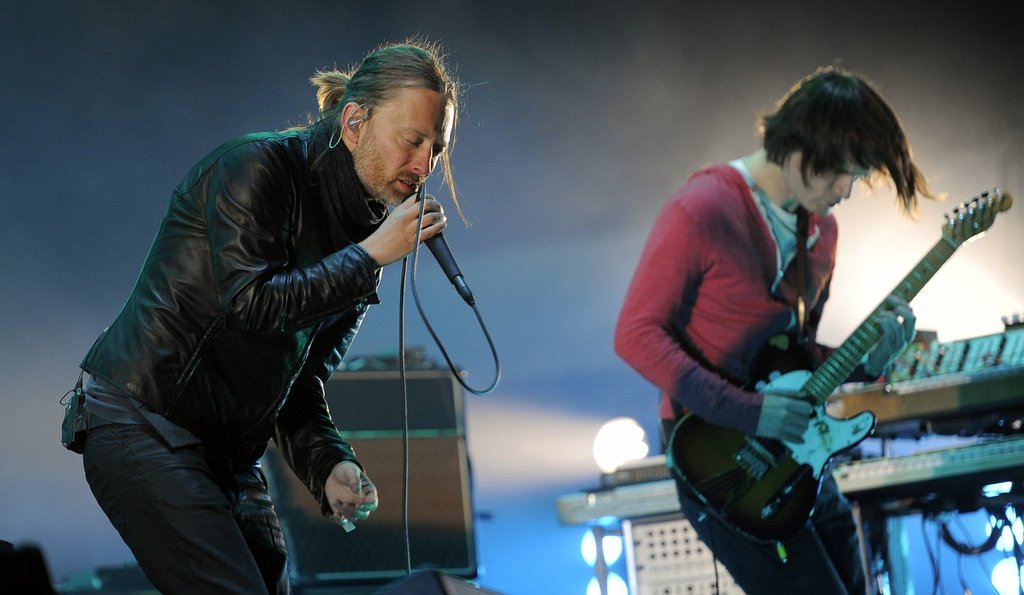 FILE - In this April 14, 2012 file photo, Thom Yorke, left, and Jonny Greenwood of Radiohead perform during the band's headlining set at the 2012 Coachella Valley Music and Arts Festival in Indio, Calif.